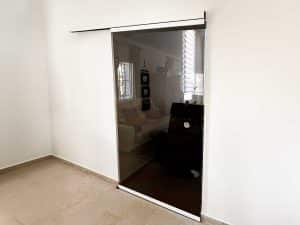 Puertas de cristal correderas y abatibles